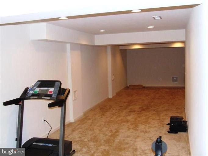1307 Stallion Street Ranson, WV 25438 - Photo 18 of 22 a view of a room with gym equipment