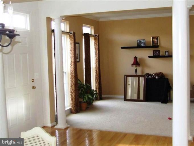 1307 Stallion Street Ranson, WV 25438 - Photo 8 of 22 a bedroom with bed and walk in closet