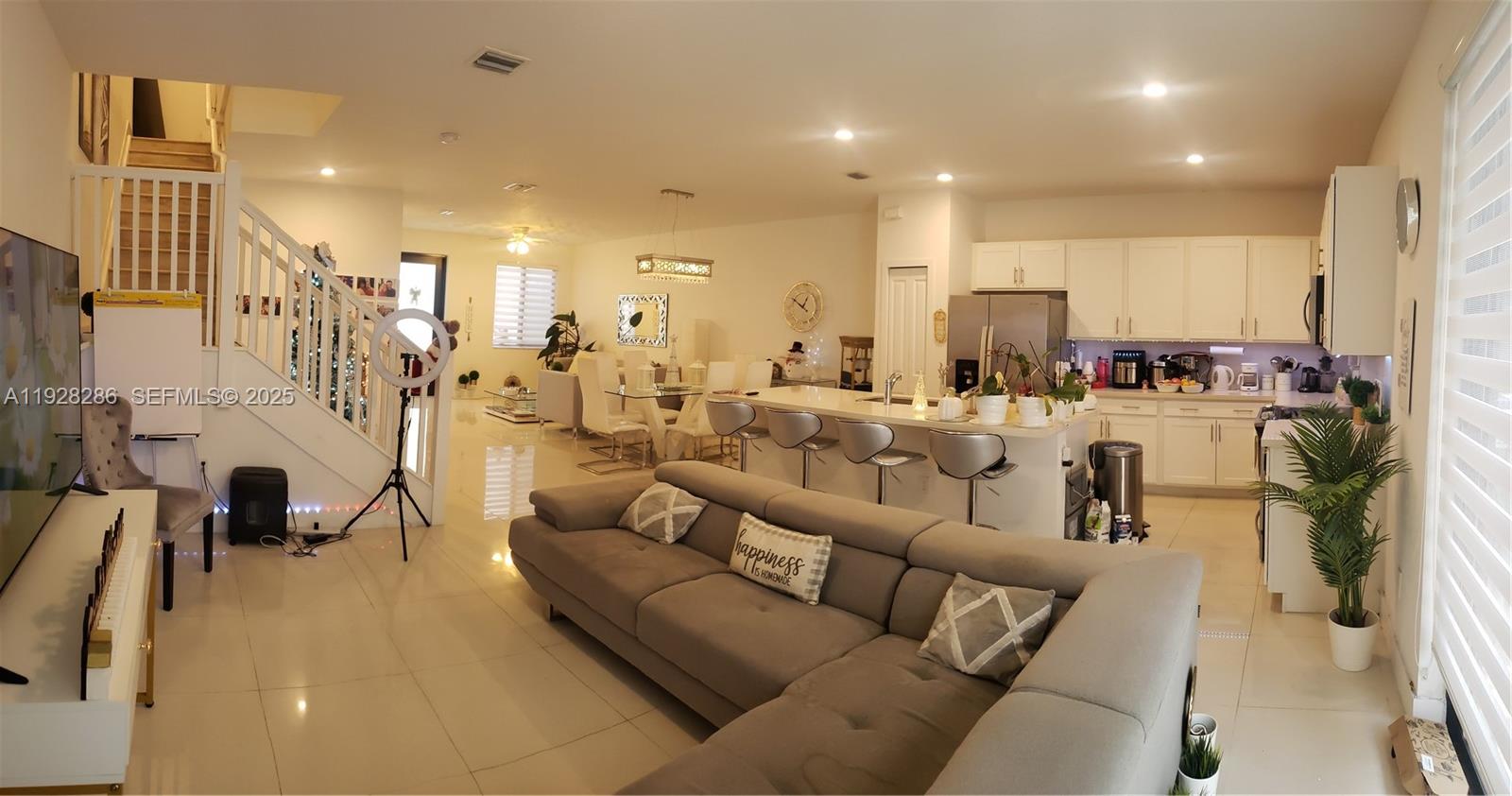 2414 Southwest 145th Place, Unit 2414 Miami, FL 33175 - Photo 12 of 29 a living room with furniture and a view of living room