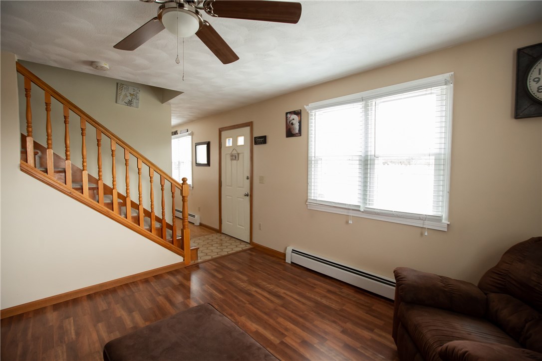 50 Edward Street Coventry, RI 02816 - Photo 3 of 17 Living Room / Front Entrance and Stairway