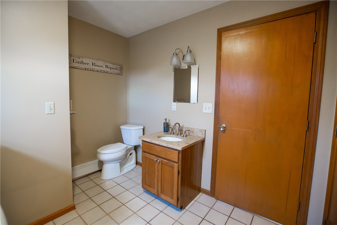 50 Edward Street Coventry, RI 02816 - Photo 8 of 17 First Floor Bathroom / Laundry Room
