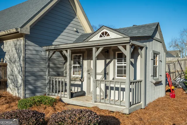 a front view of a house with a porch