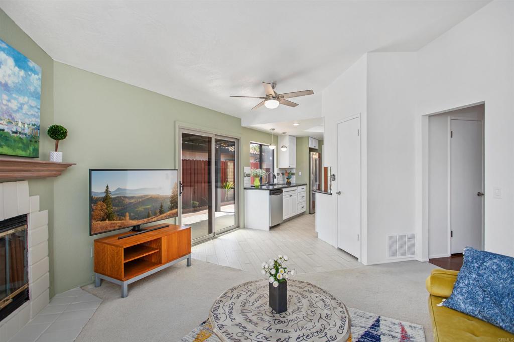 5312 Ontario Street Oceanside, CA 92056 - Photo 21 of 48 a living room with furniture and a flat screen tv