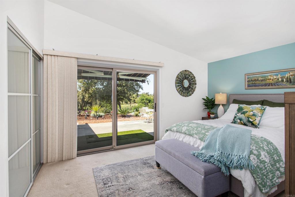 5312 Ontario Street Oceanside, CA 92056 - Photo 23 of 48 a bed sitting in a bedroom next to a window