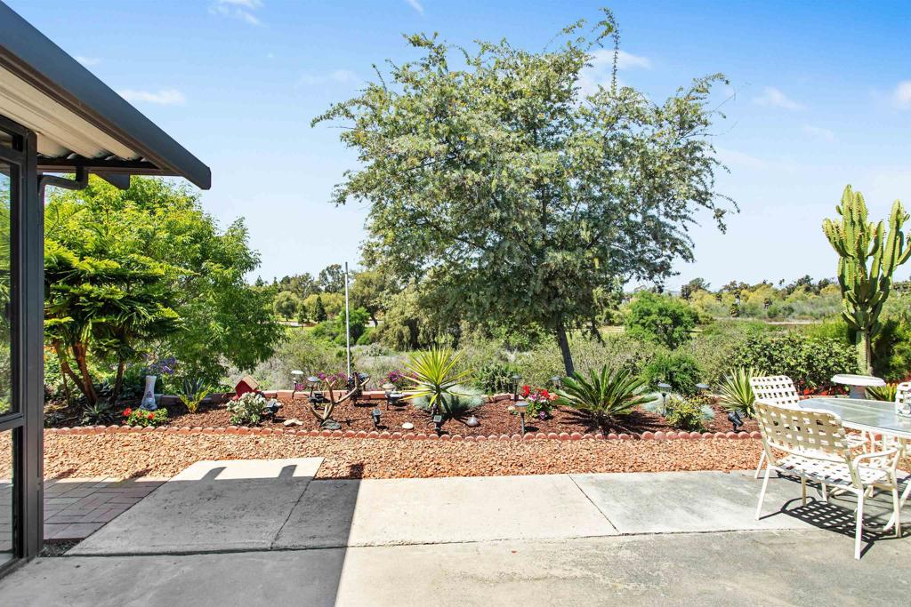 5312 Ontario Street Oceanside, CA 92056 - Photo 42 of 48 a view of backyard with plants and outdoor seating