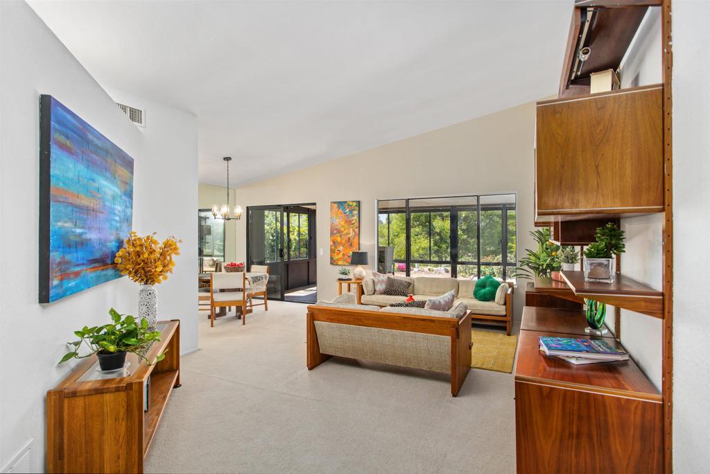 5312 Ontario Street Oceanside, CA 92056 - Photo 9 of 48 a living room with patio furniture and a potted plant