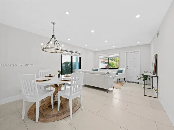 a view of a dining room with furniture
