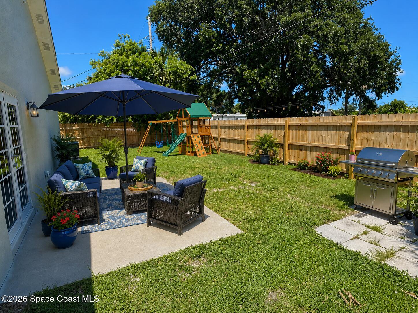 2839 Colbert Circle Melbourne, FL 32901 - Photo 26 of 27 Virtually Staged Backyard