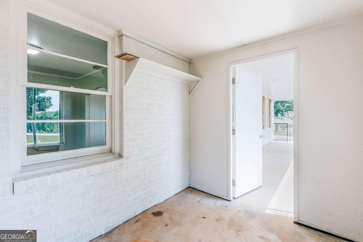 52 Clark Circle Lexington, GA 30648 - Photo 22 of 47 a view of an empty room with a window
