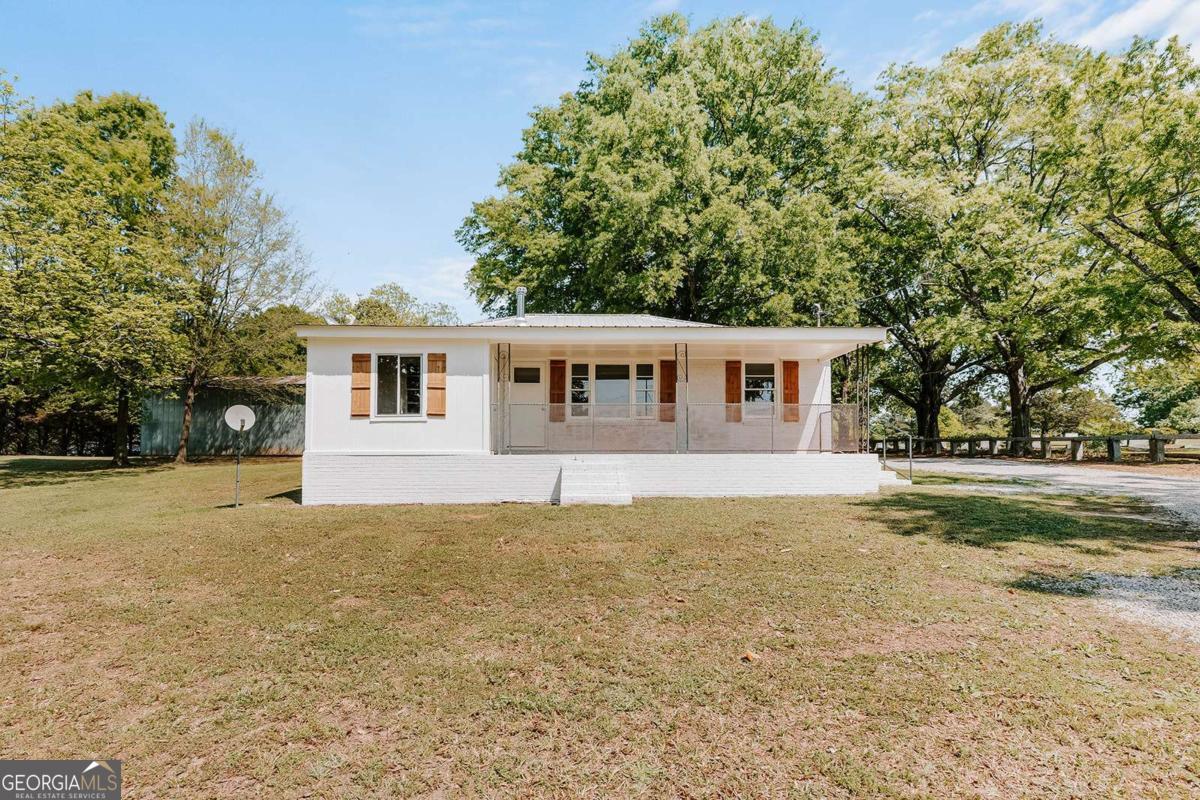 52 Clark Circle Lexington, GA 30648 - Photo 3 of 47 a view of a house with a yard