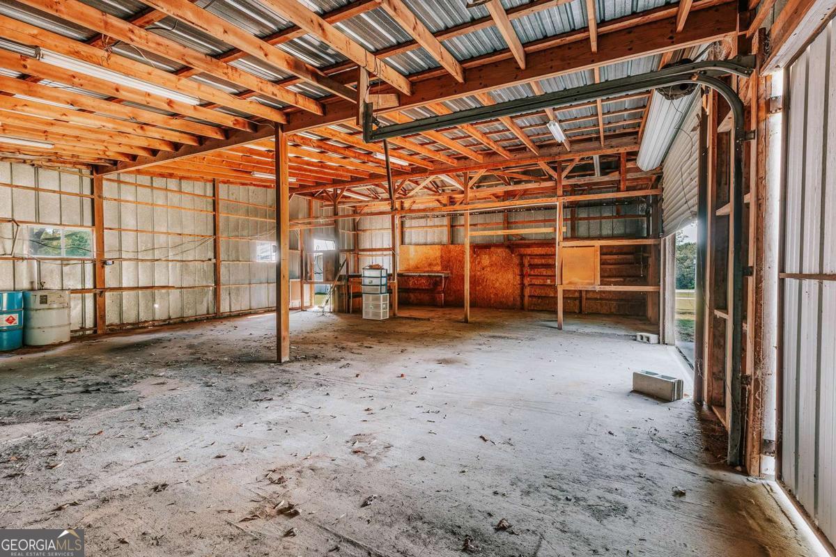 52 Clark Circle Lexington, GA 30648 - Photo 40 of 47 a view of a room with wooden walls