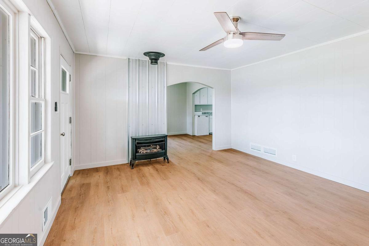 52 Clark Circle Lexington, GA 30648 - Photo 8 of 47 a view of an empty room with a window