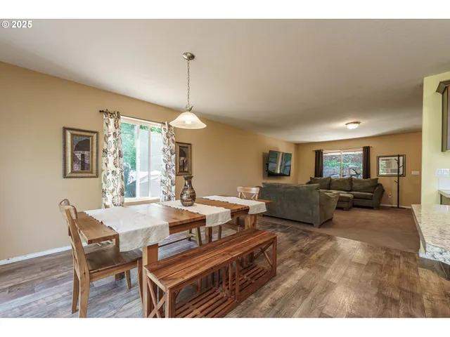 a view of a dining room with furniture