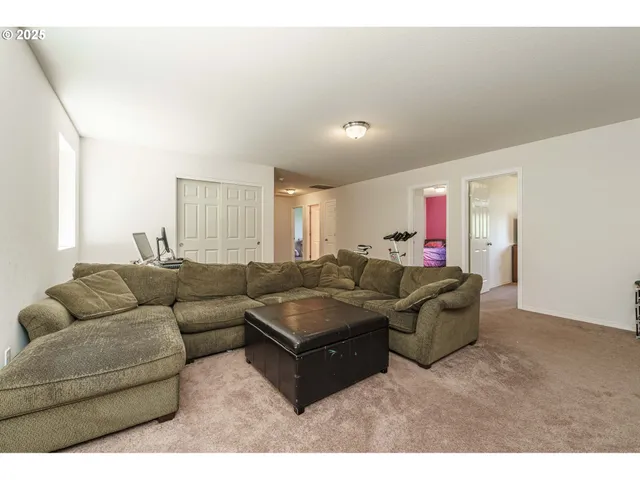 a living room with furniture and a couch