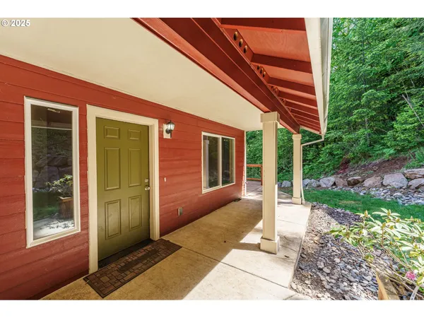 a backyard of a house with seating space