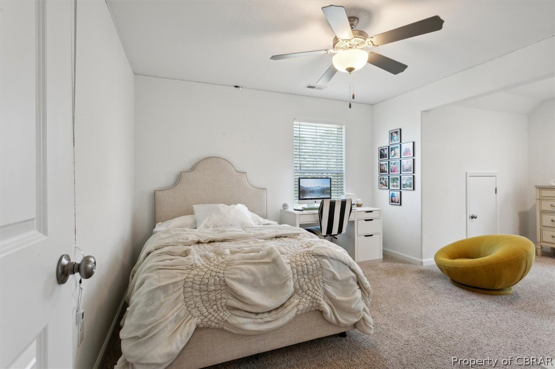 2051 Holland Corner Road Suffolk, VA 23437 - Photo 23 of 50 Carpeted bedroom featuring ceiling fan