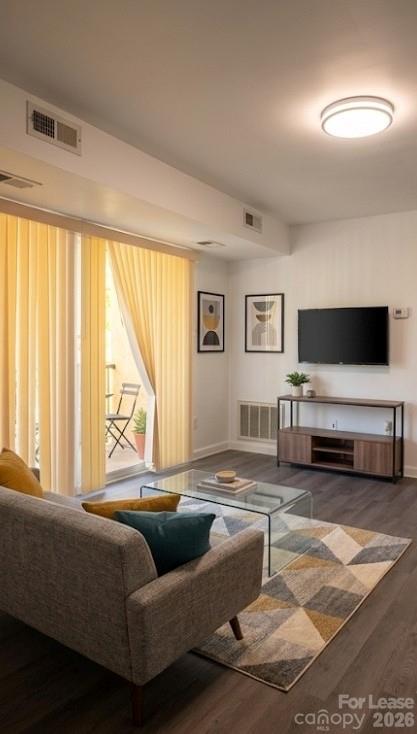 9333 Old Concord Road, Unit J Charlotte, NC 28213 - Photo 6 of 18 a living room with furniture and large windows