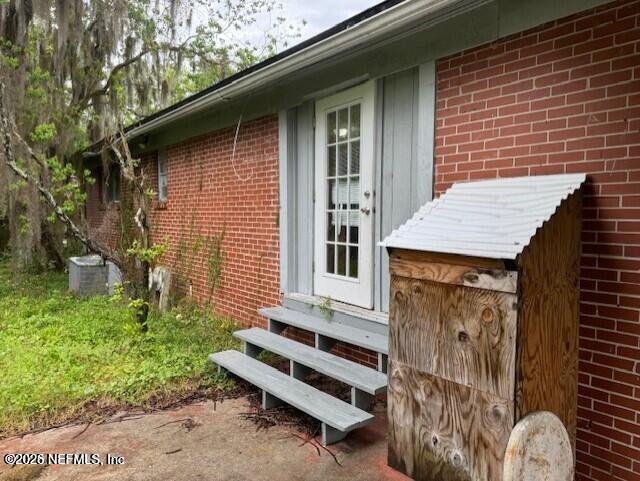 5332 Colonial Avenue Jacksonville, FL 32210 - Photo 15 of 15 a front view of a house with a garden