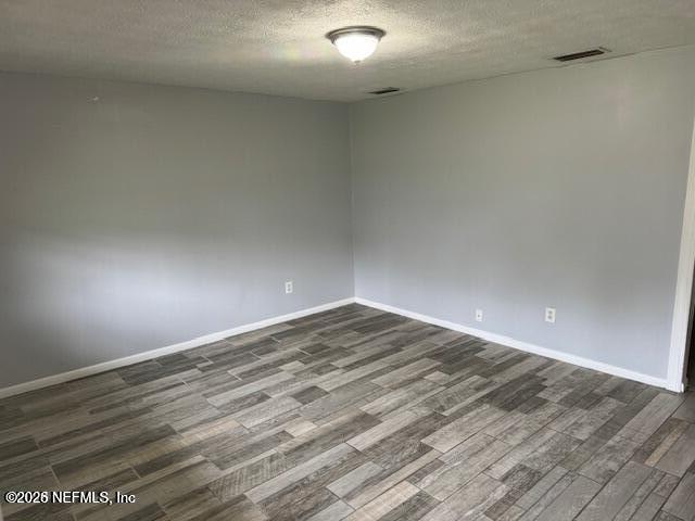 5332 Colonial Avenue Jacksonville, FL 32210 - Photo 3 of 15 a view of empty room with wooden floor