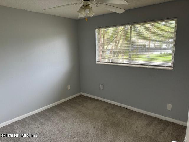 5332 Colonial Avenue Jacksonville, FL 32210 - Photo 6 of 15 an empty room with a window