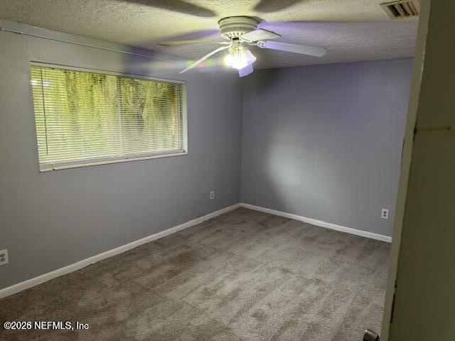 5332 Colonial Avenue Jacksonville, FL 32210 - Photo 8 of 15 an empty room with windows and fan