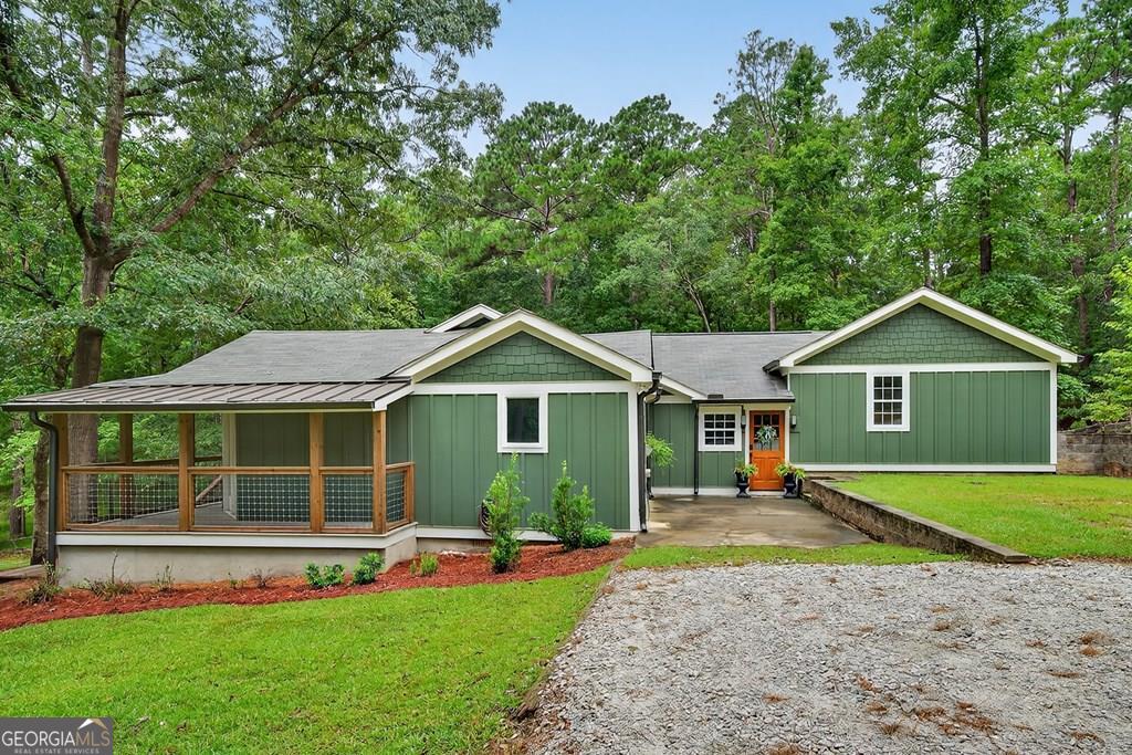 front view of a house with a yard