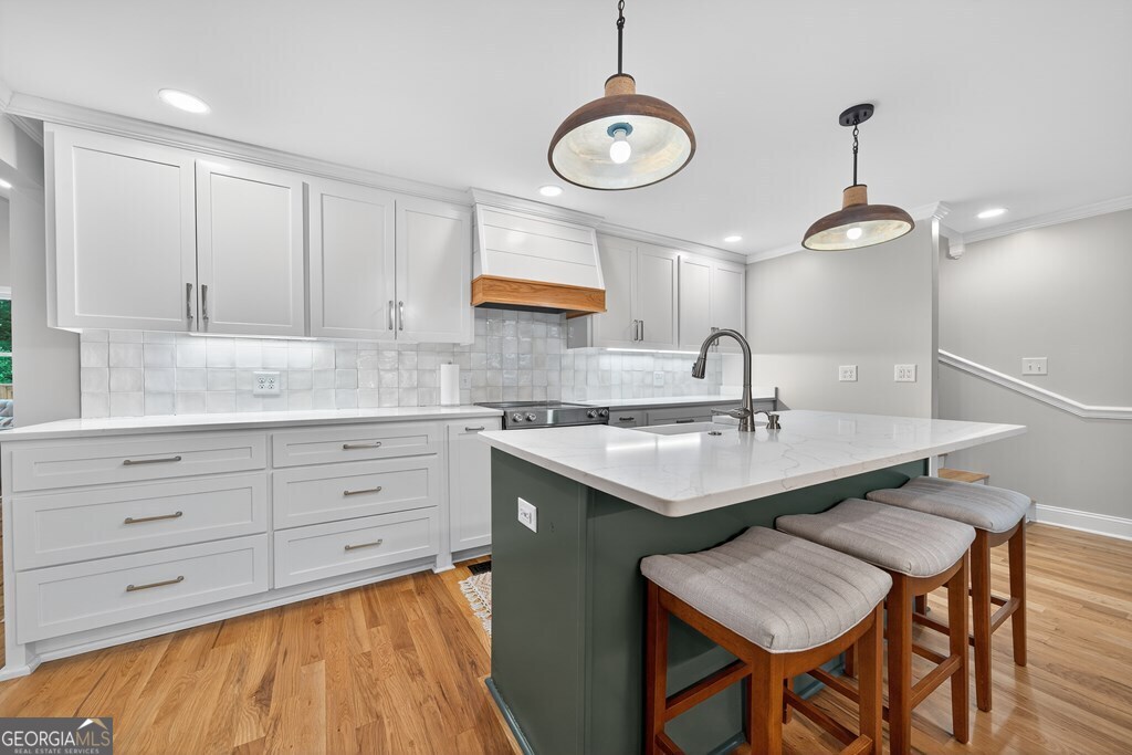 291 Power Point Milledgeville, GA 31061 - Photo 12 of 51 a kitchen with a sink cabinets and window