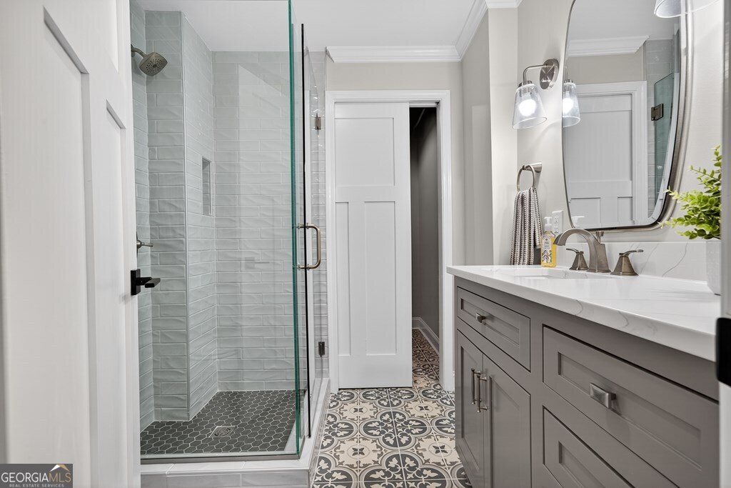 291 Power Point Milledgeville, GA 31061 - Photo 17 of 51 a bathroom with a shower sink and mirror