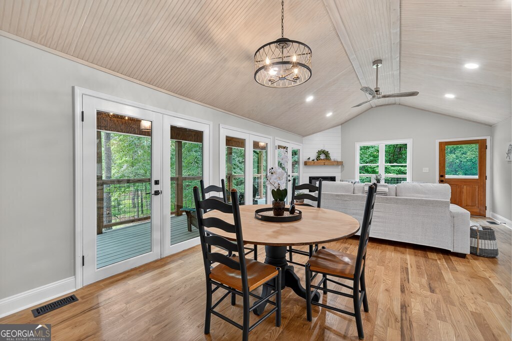 291 Power Point Milledgeville, GA 31061 - Photo 21 of 51 a view of a dining room with furniture window and wooden floor