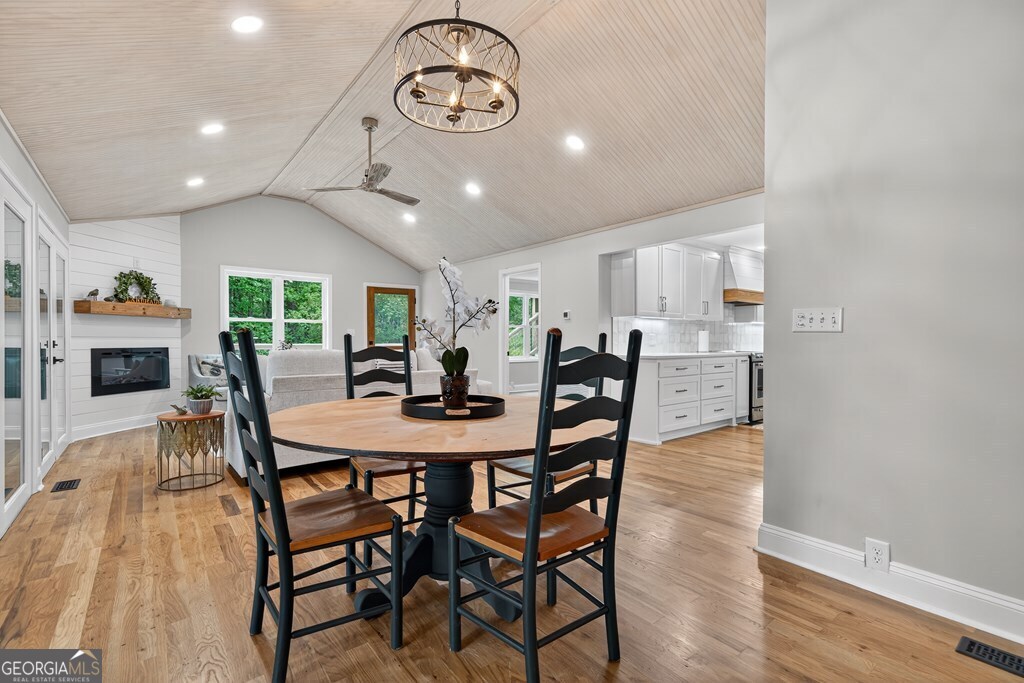 291 Power Point Milledgeville, GA 31061 - Photo 22 of 51 a view of a dining room with furniture and wooden floor