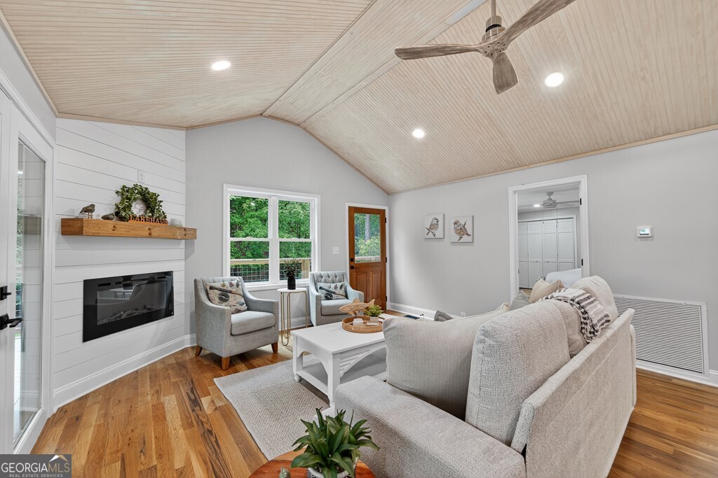 291 Power Point Milledgeville, GA 31061 - Photo 23 of 51 a living room with furniture fireplace and window
