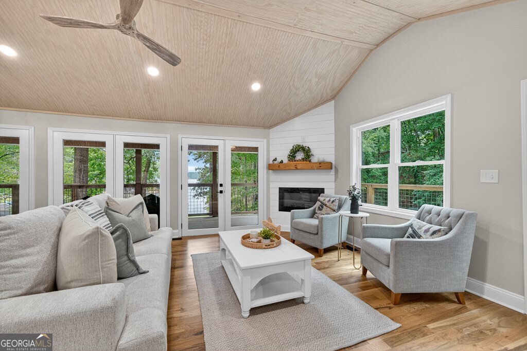 291 Power Point Milledgeville, GA 31061 - Photo 24 of 51 a living room with furniture and a fireplace