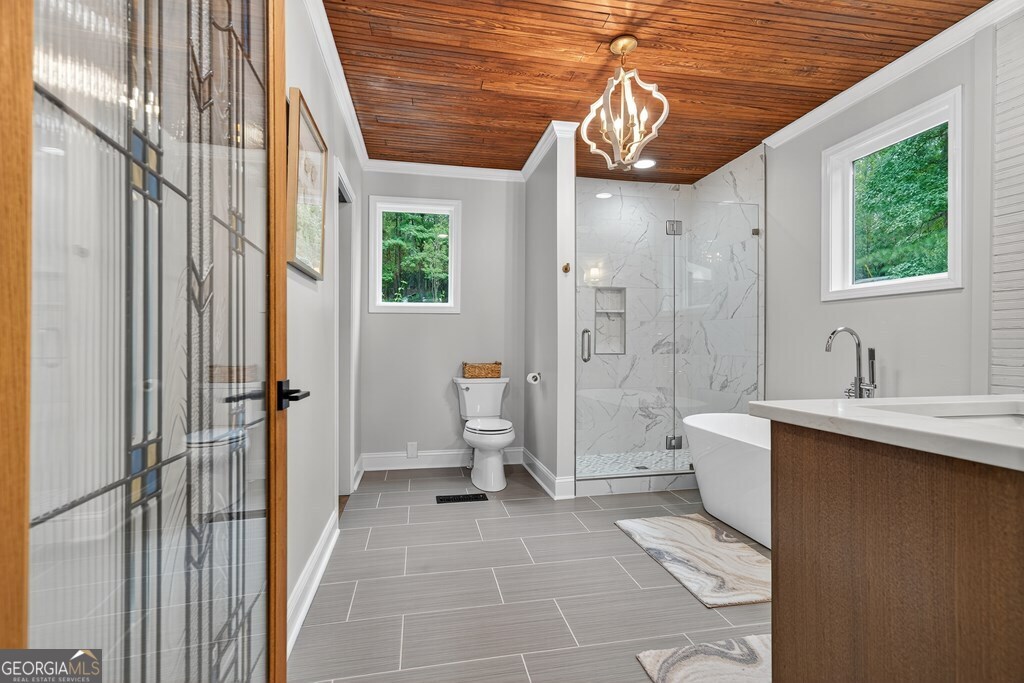 291 Power Point Milledgeville, GA 31061 - Photo 32 of 51 a bathroom with a sink a toilet and shower