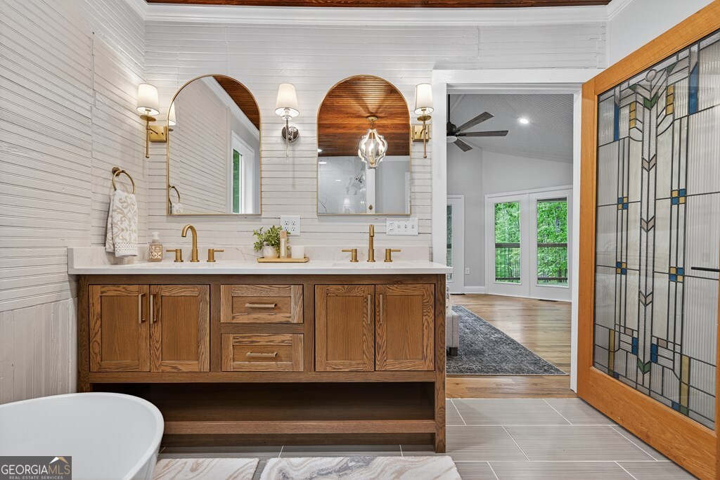 291 Power Point Milledgeville, GA 31061 - Photo 34 of 51 a bathroom with a sink and a mirror