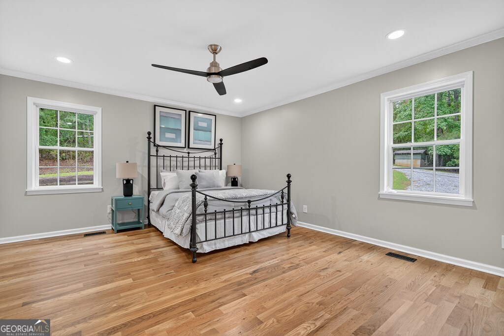 291 Power Point Milledgeville, GA 31061 - Photo 37 of 51 a bedroom with a bed and window