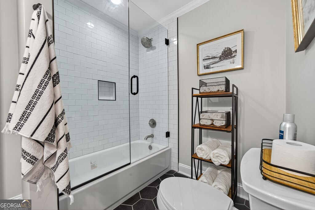 291 Power Point Milledgeville, GA 31061 - Photo 40 of 51 a bathroom with a toilet sink and shower