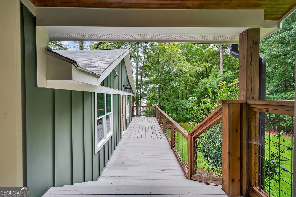 291 Power Point Milledgeville, GA 31061 - Photo 50 of 51 a view of a pathway of a house with wooden floor