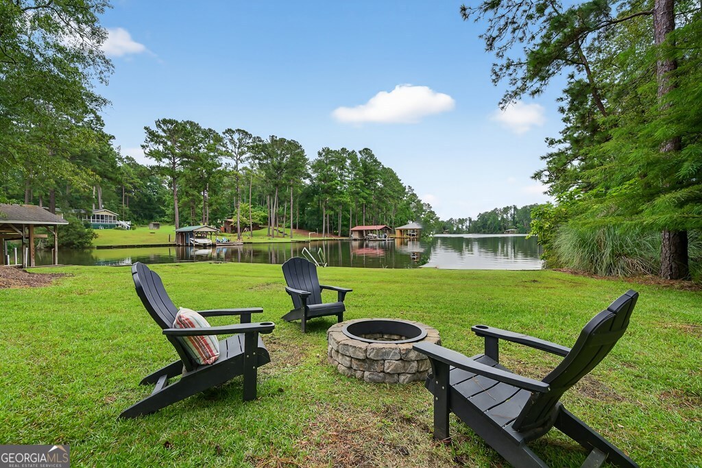 291 Power Point Milledgeville, GA 31061 - Photo 5 of 51 a view of a garden with lawn chairs