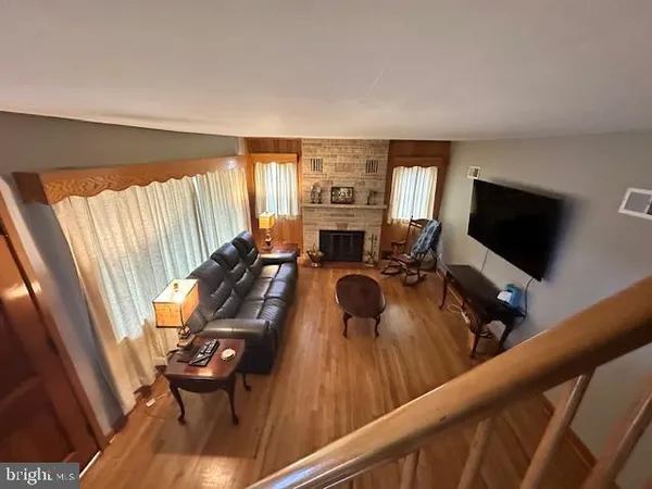 a view of a living room and a flat screen tv