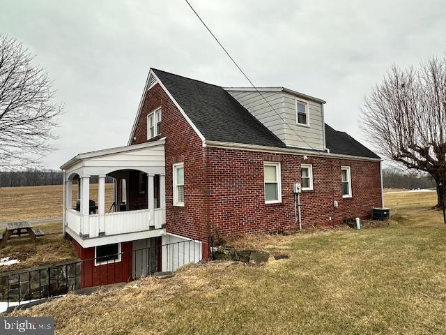 19642 Raystown Road James Creek, PA 16657 - Photo 3 of 38 a front view of a house with a yard
