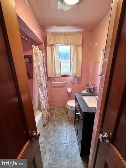 19642 Raystown Road James Creek, PA 16657 - Photo 33 of 38 a bathroom with a sink a toilet a mirror and a tub