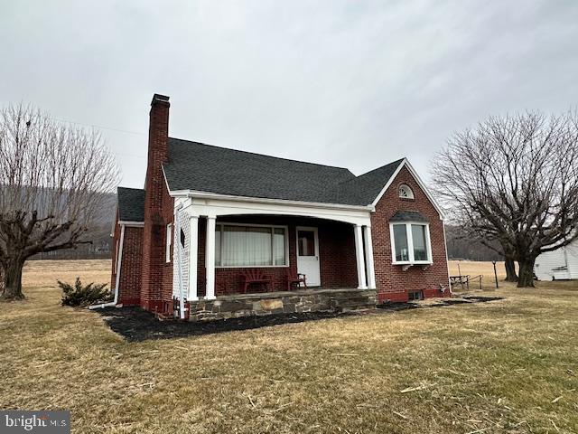 19642 Raystown Road James Creek, PA 16657 - Photo 5 of 38 a front view of a house with yard