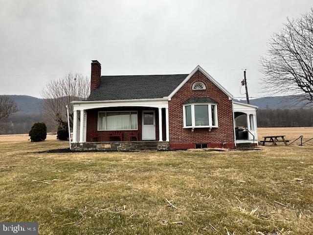 19642 Raystown Road James Creek, PA 16657 - Photo 10 of 38 a front view of a house with a yard