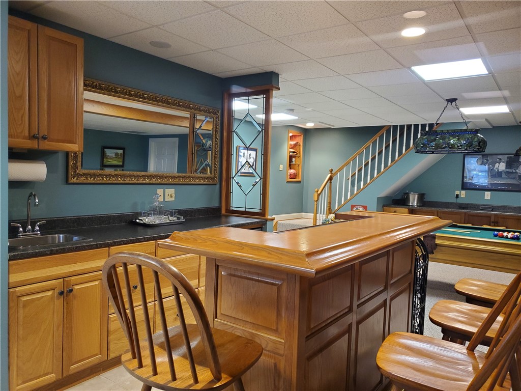 6 Quoin Crescent Victor, NY 14564 - Photo 36 of 50 FLEXIBLE SERVICE BAR SPACE LOOKING TOWARD THE STAI