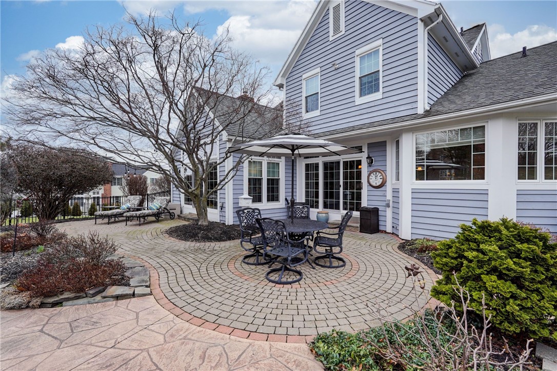 6 Quoin Crescent Victor, NY 14564 - Photo 45 of 50 A BEAUTIFUL BACK PATIO OFFERS A VARIETY OF ENTERTA