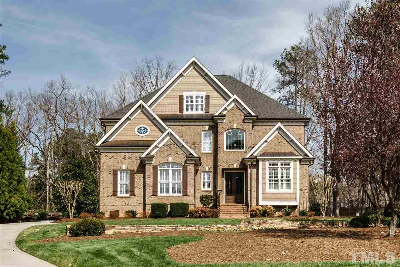 2000 Angelwing Court Raleigh, NC 27613 - Photo 1 of 25 a front view of a house with a yard