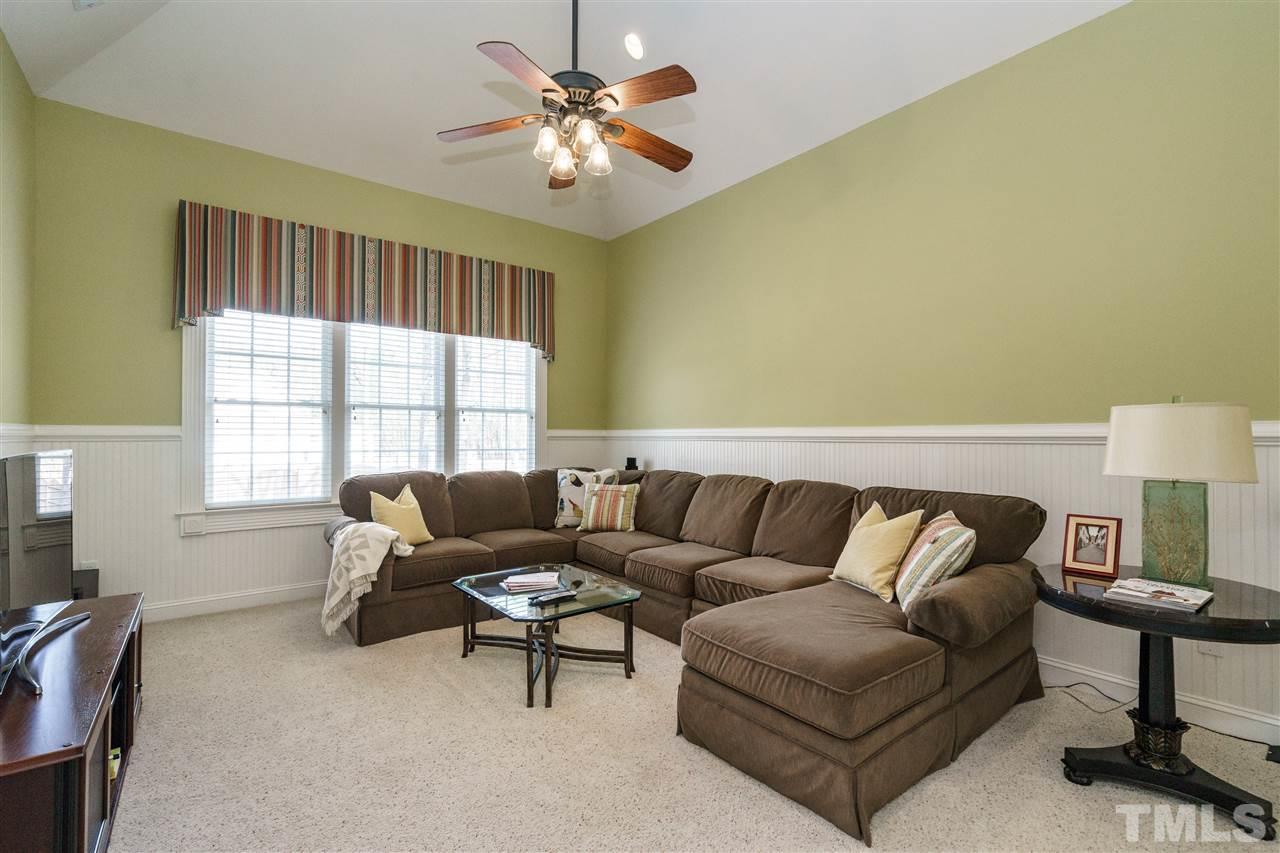2000 Angelwing Court Raleigh, NC 27613 - Photo 23 of 25 a living room with furniture and a window