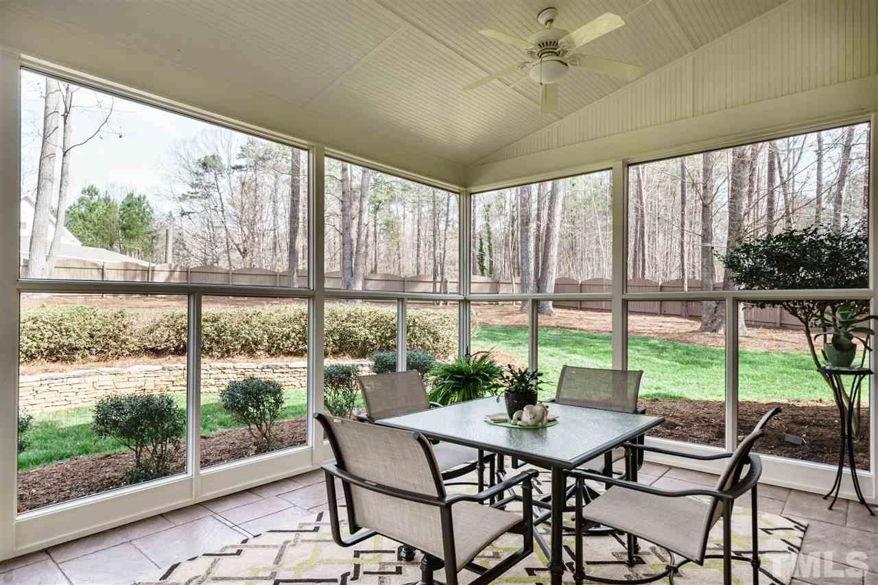 2000 Angelwing Court Raleigh, NC 27613 - Photo 24 of 25 a view of a city from a dining room with furniture and window