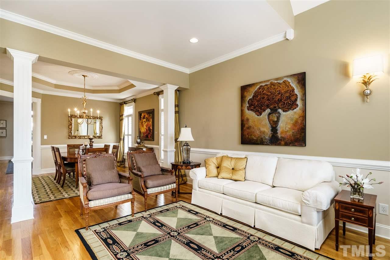 2000 Angelwing Court Raleigh, NC 27613 - Photo 5 of 25 a living room with furniture and wooden floor