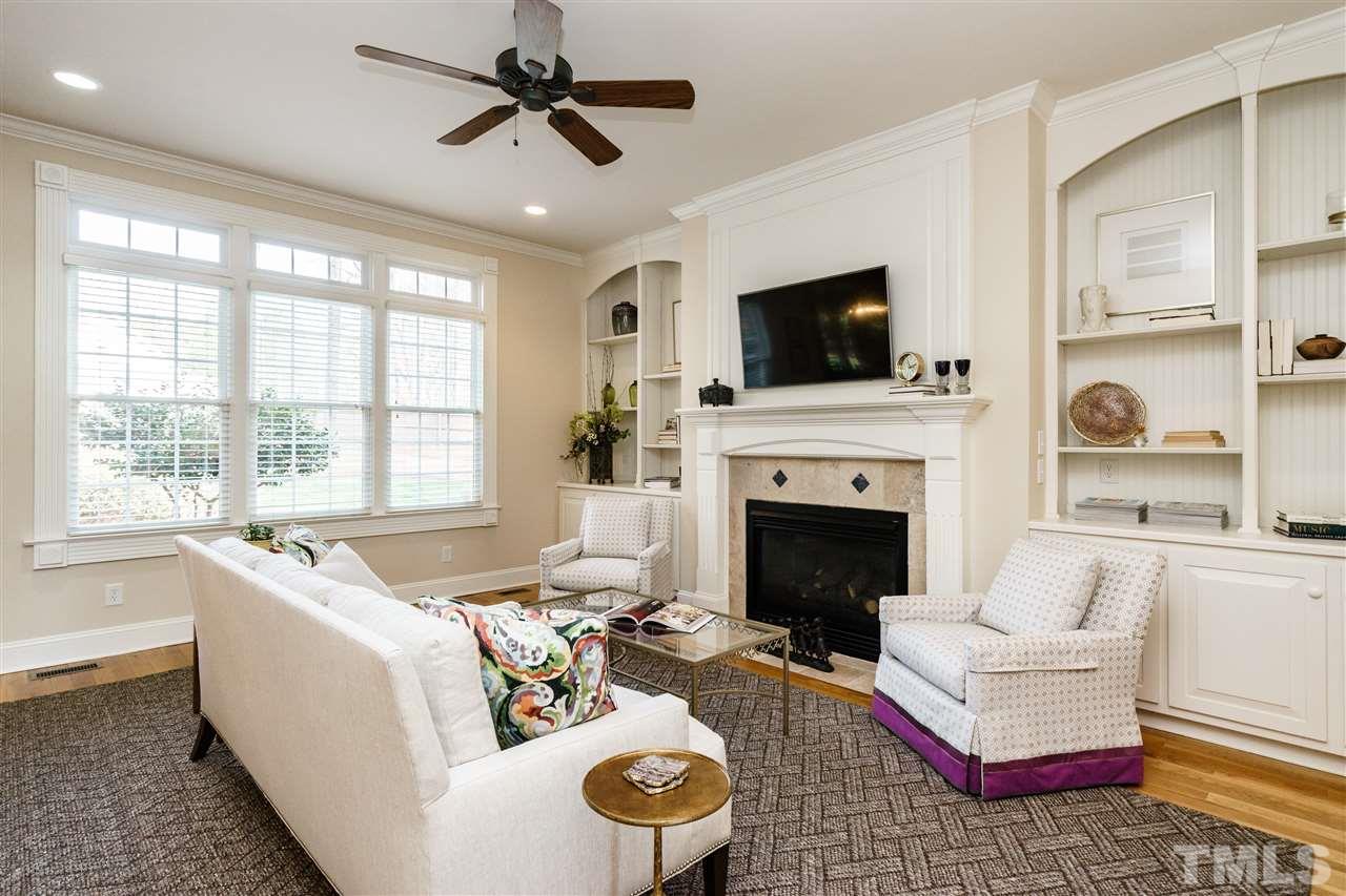 2000 Angelwing Court Raleigh, NC 27613 - Photo 9 of 25 a living room with furniture fireplace and window